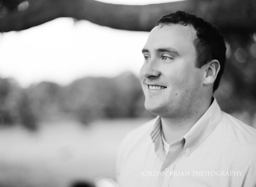 Katarina and Kyle with the Philadelphia skyline in the background at Fairmount Park engagement