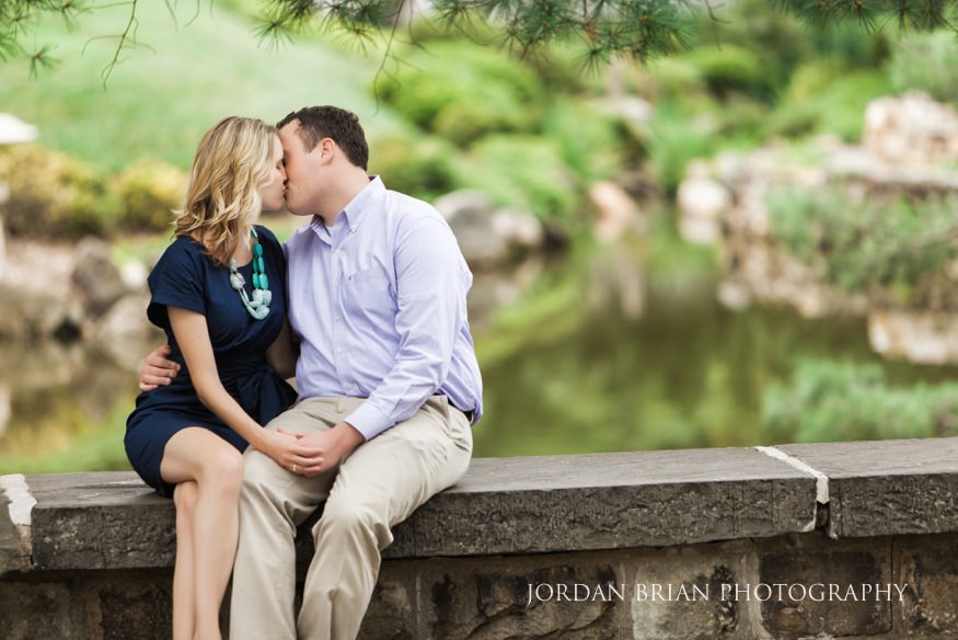 Katarina and Kyle laughing among spring blooms in Fairmount Park Philadelphia