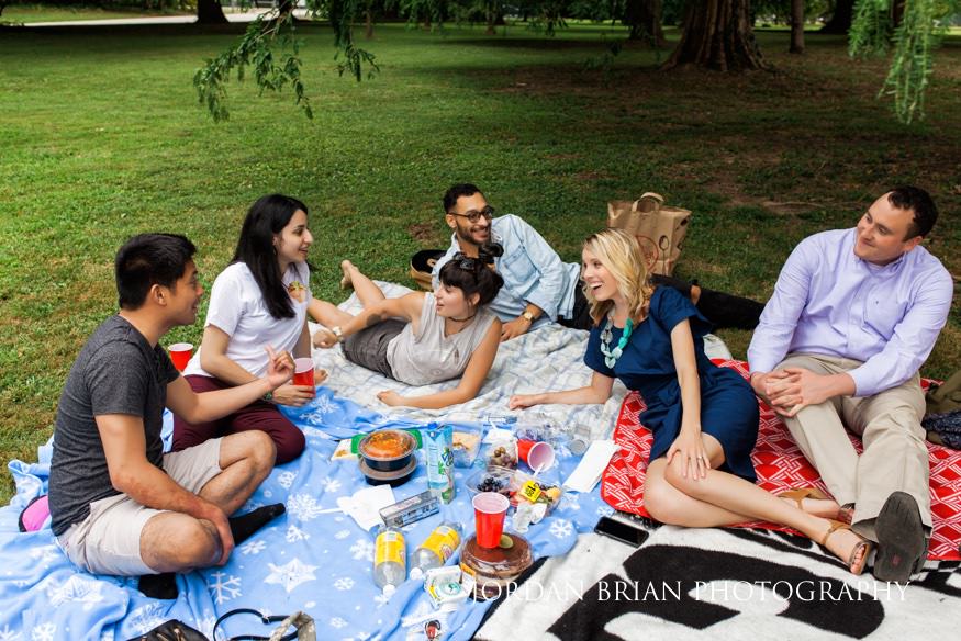 Katarina and Kyle sharing a moment with their new friends at Fairmount Park engagement