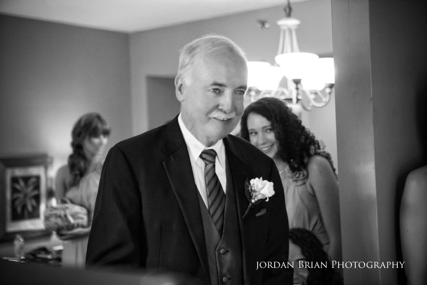 first look between father and bride before grounds for sculpture wedding