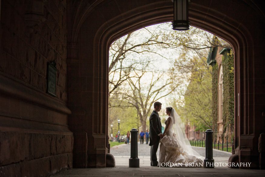 bride and groom in front of princeton university before grounds for sculpture wedding