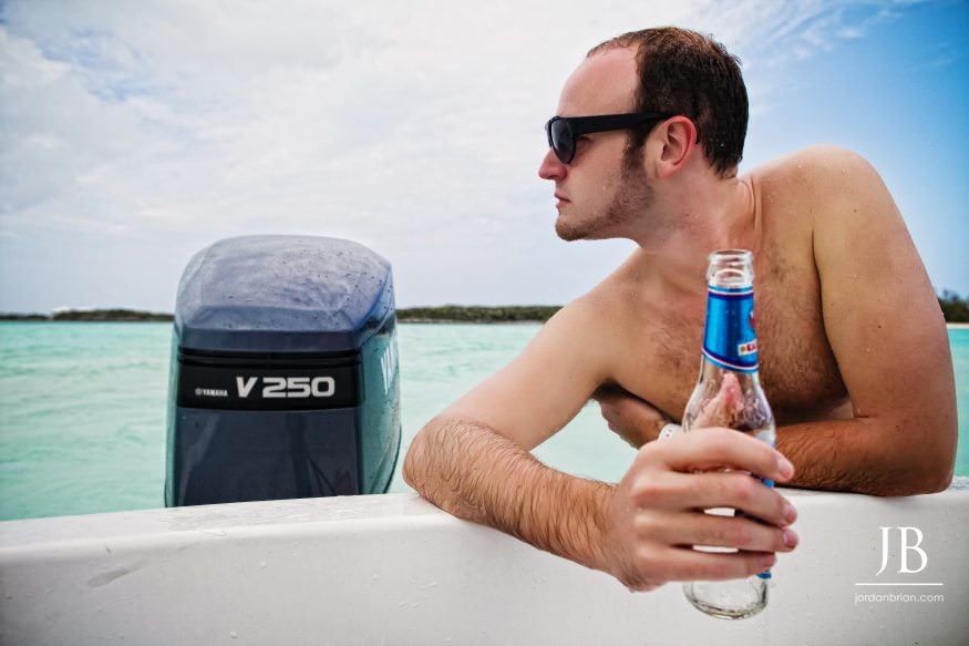 Katie and Luke engagement portrait at Hope Town boat dock Bahamas
