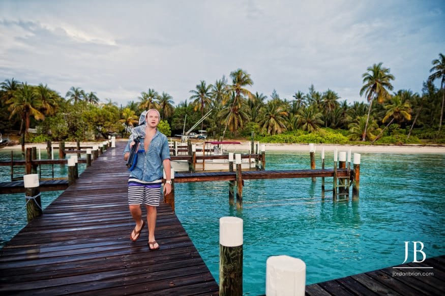Tim DJ Naptime assisting engagement shoot at Hope Town boat dock Bahamas
