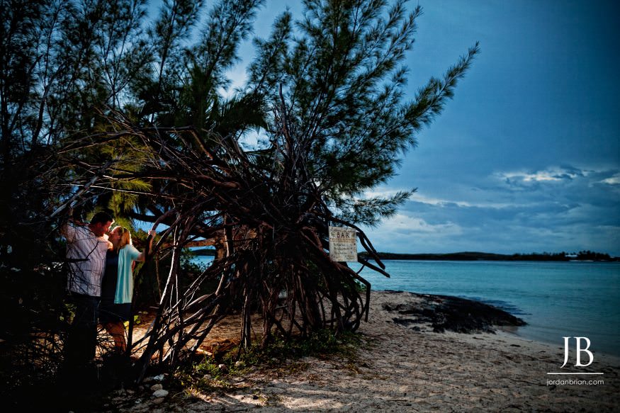 Katie and Luke engagement portrait at Hope Town Bahamas boat dock dusk