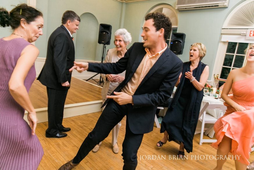 reception dancing at groom smoking cigar colonial dames society