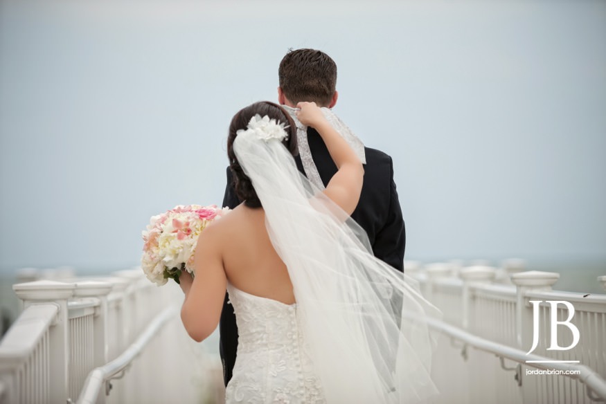 Kim and Kevin laughing during Cape May beach wedding portraits