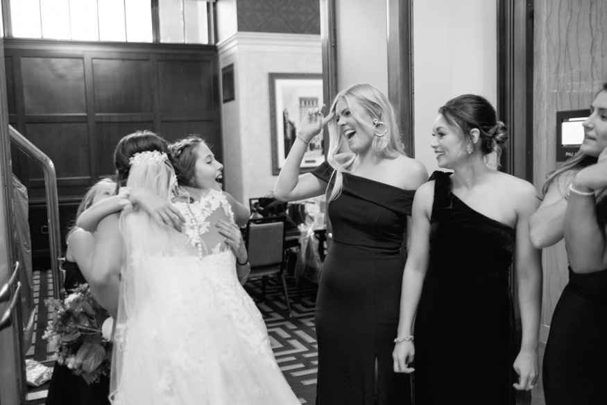 Bride's first look with Bridal Party at the Notary Hotel.