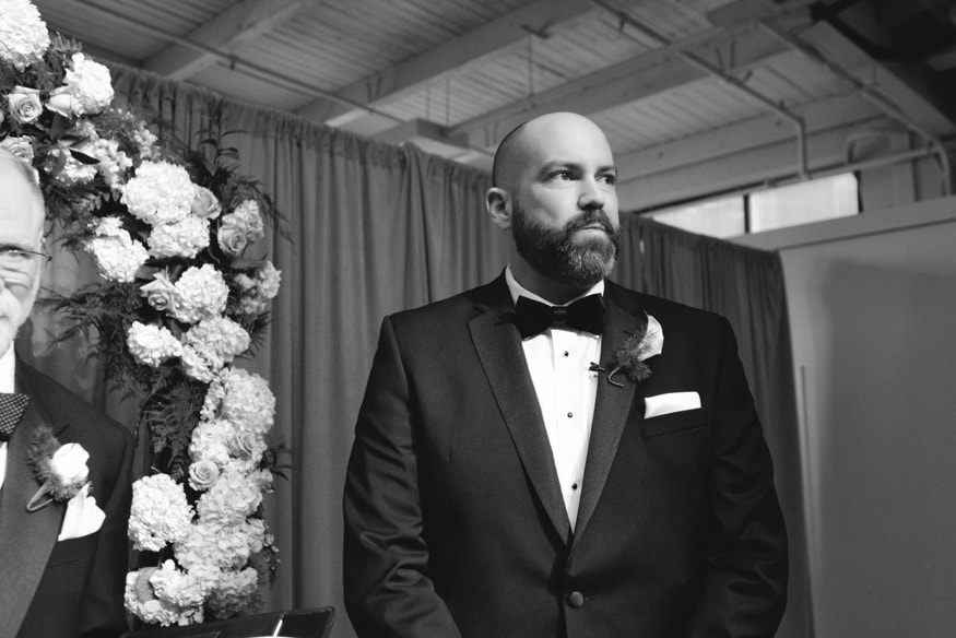 Groom seeing the bride for the first time at Moulin wedding.