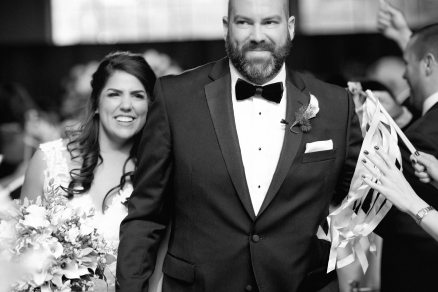 Bride and groom exiting wedding ceremony at Moulin Philadelphia.
