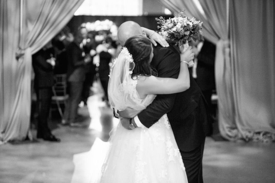 Bride and groom exiting wedding ceremony at Moulin Philadelphia.