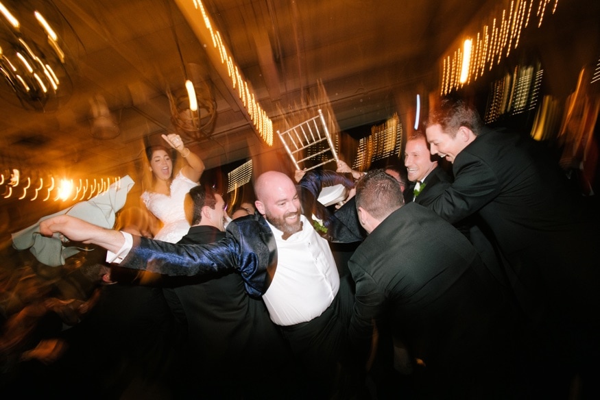 Bride and groom dancing the horah at Moulin Philadelphia wedding.