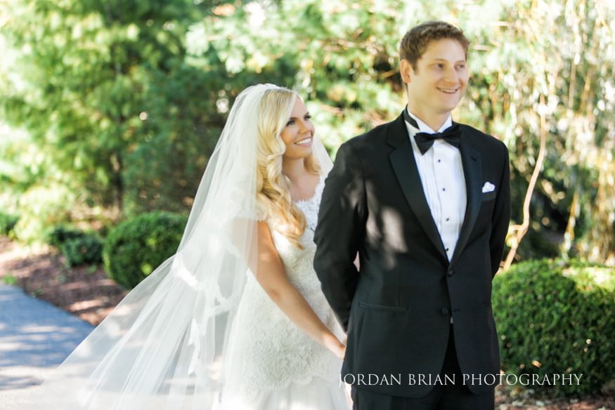 Bride and groom first look at Windows on the Water Frogbridge wedding.