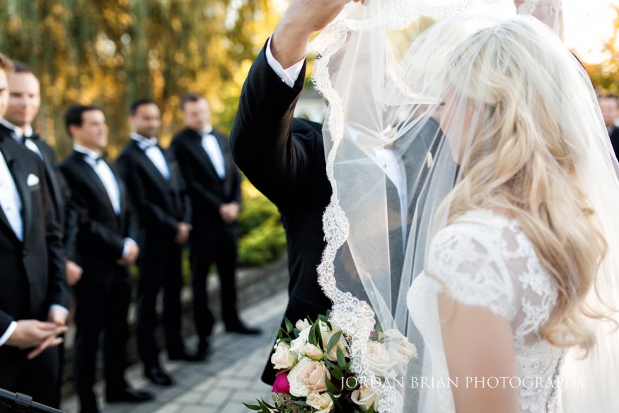 Outdoor wedding ceremony at Windows on the Water Frogbridge.