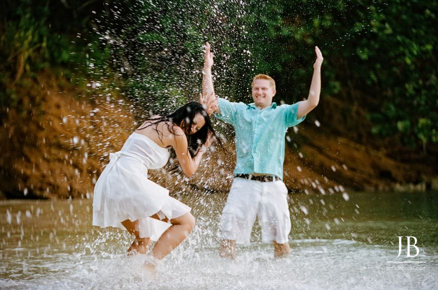Jason holding Laurie during destination engagement session at Grand Palladium Jamaica