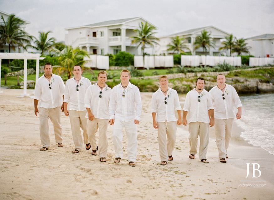 Laurie and Jason laughing on the beach, Jamaica wedding portrait session