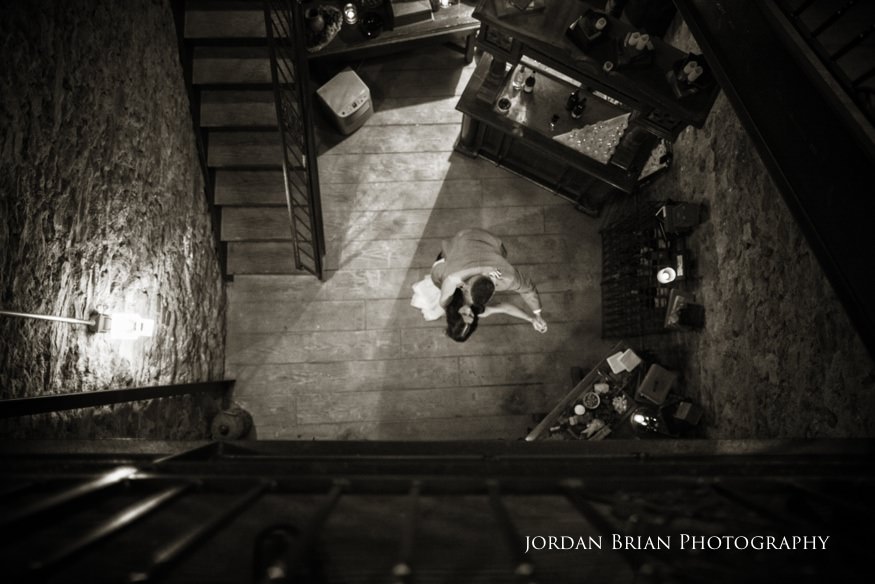 bride and groom dancing in wine cellar at knowlton mansion