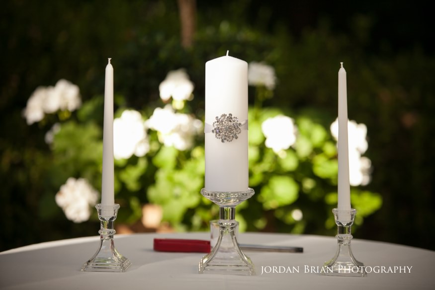 candles at knowlton mansion wedding ceremony