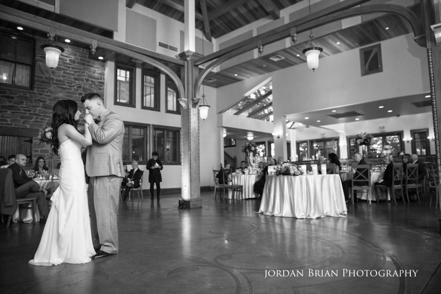 groom kissing bride during first dance at knowlton mansion
