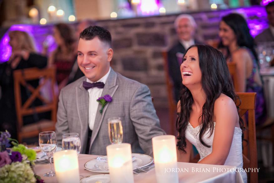 bride and groom laughing at wedding reception at knowlton mansion