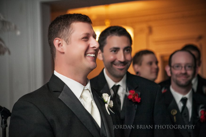Groom looking at bride Down Town Club Ceremony