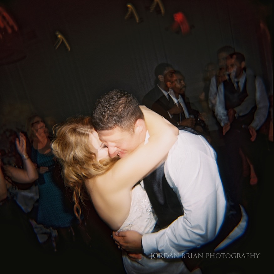 Holga film of Bride and groom dancing to Jellyroll band at Cescaphe Downtown Club Wedding in Philadelphia