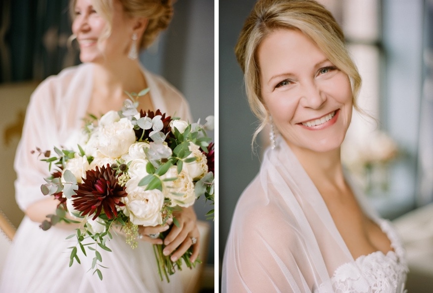 Lynn smiling into the mirror at Hotel Monaco, ready to head to the ceremony.