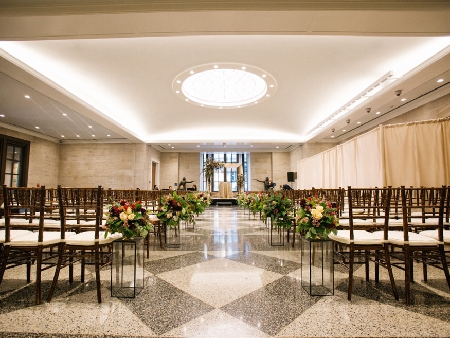 DFW Event Design ceremony florals at the Museum of the American Revolution entranceway.