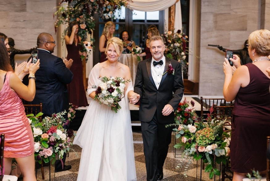 Decor and flowers by DFW Event Design at Museum of American Revolution wedding ceremony.