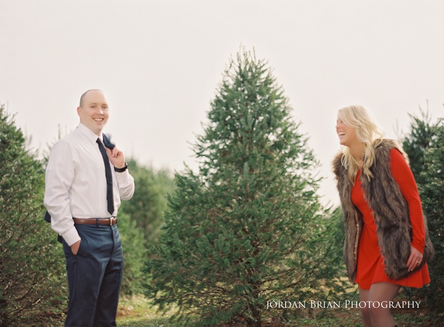 Megan and Kevin portrait in suit and dress at the Vineland Christmas tree farm