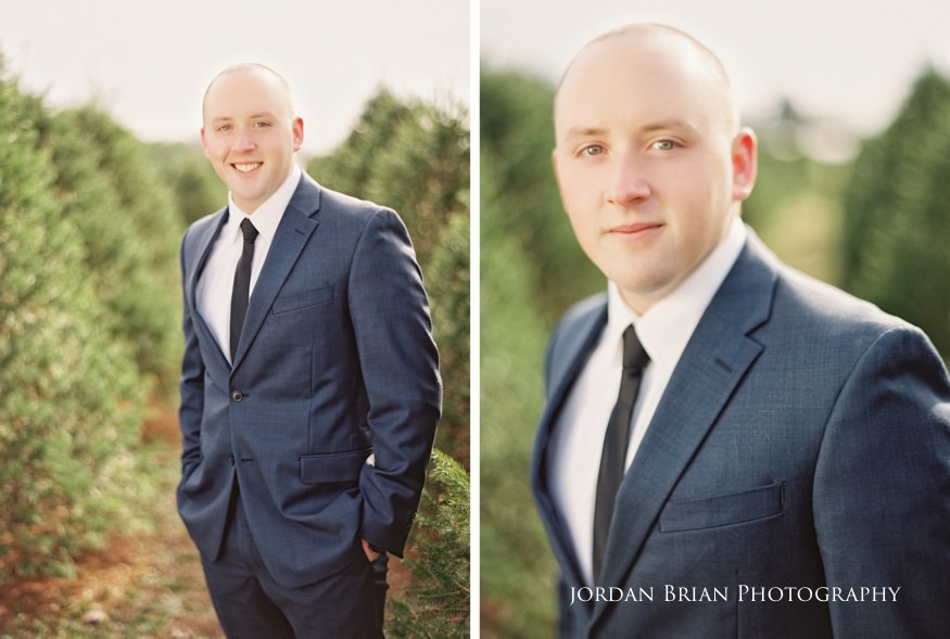 Kevin in his Navy sailor uniform during the South Jersey engagement session at the Christmas tree farm