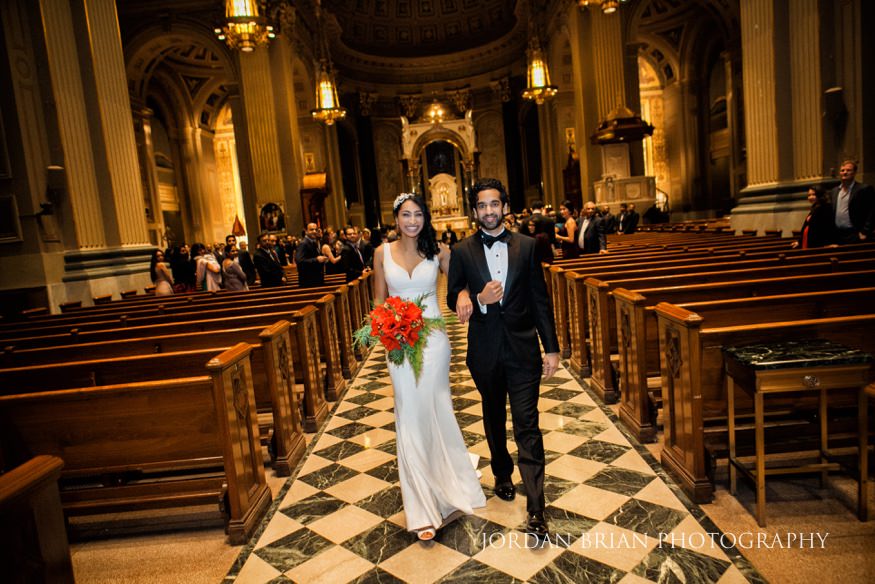 Bride and Groom leaving Cathedral Basilica wedding in Philadelphia.