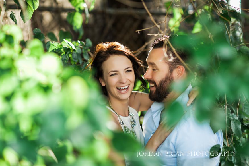couple by tree at philadelphia engagement