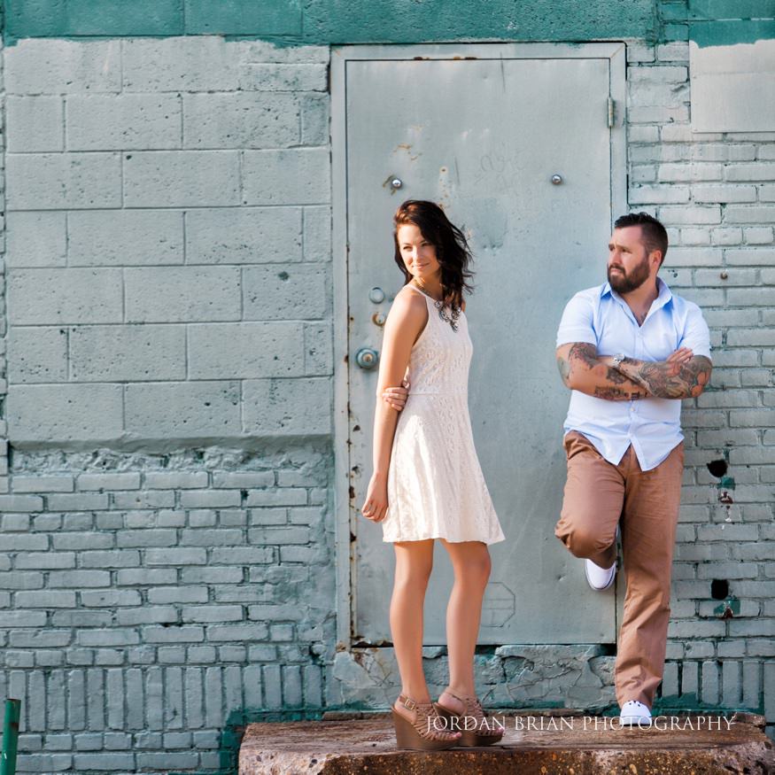 couple infront of blue wall at philly engagment