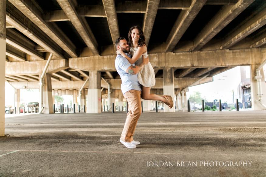 portrait of couple under overpass at philadelphia engagement
