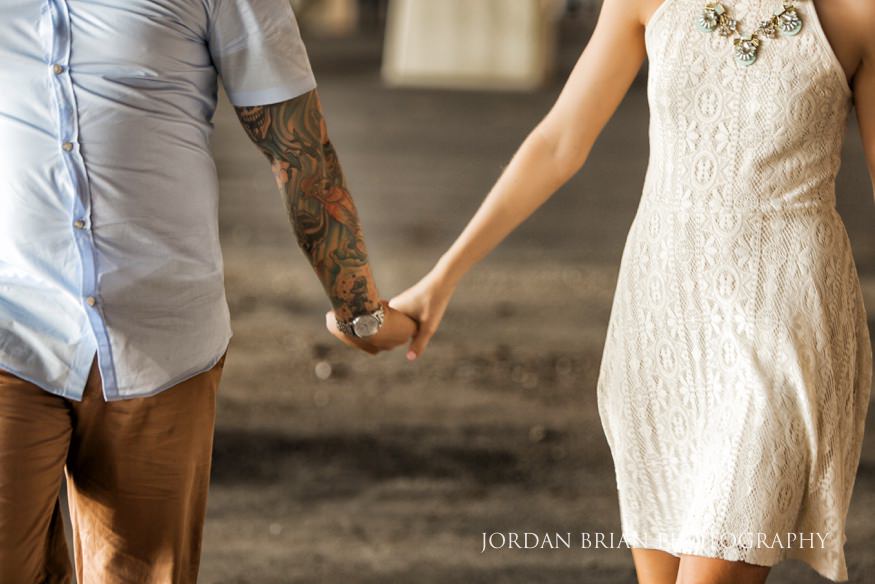 couple holding hands at philadelphia engagement session