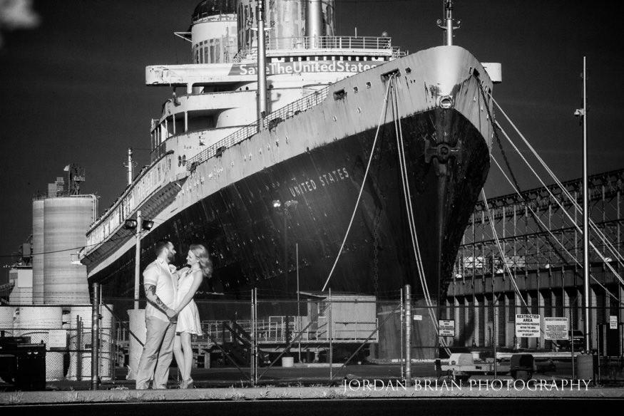 couple infront of SS united states ship at philadelphia engagement session