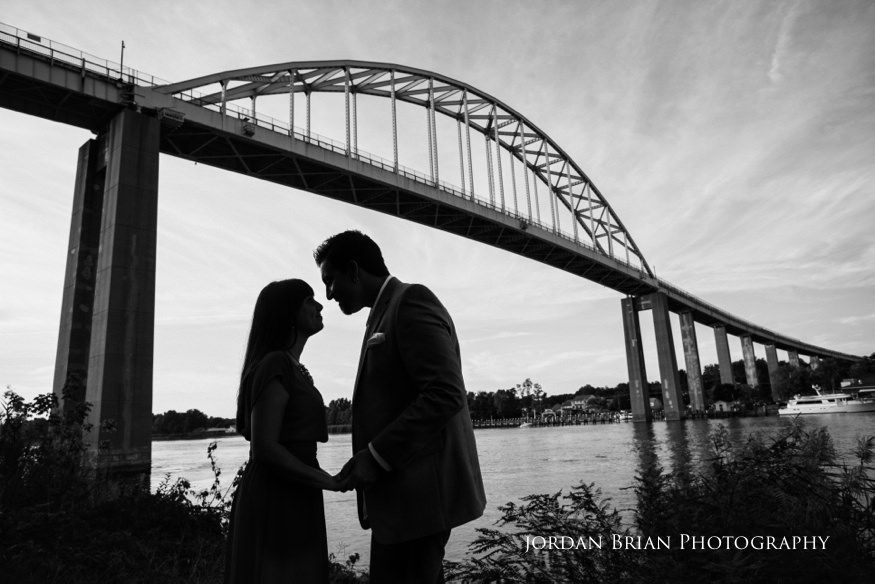 couple infront of chesapeake city bridge engagement session