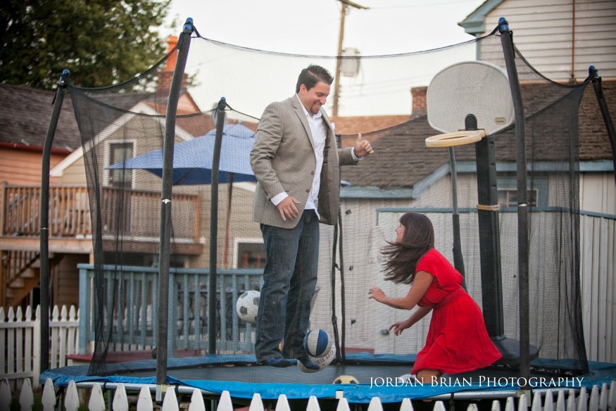 couple on trampoline for chesapeake city engagement session