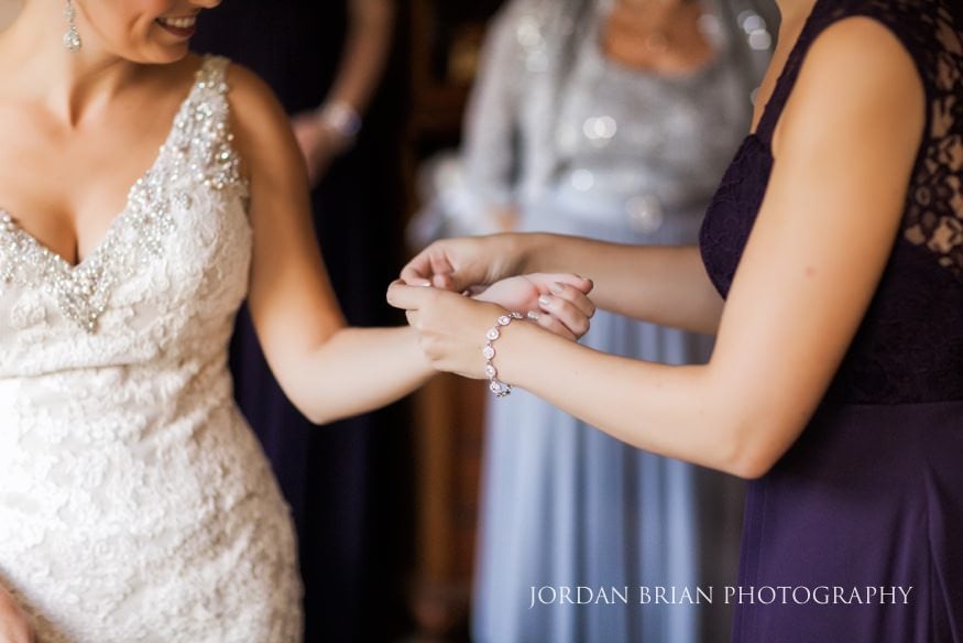 Bride final touches before Old Mill at Rose Valley wedding