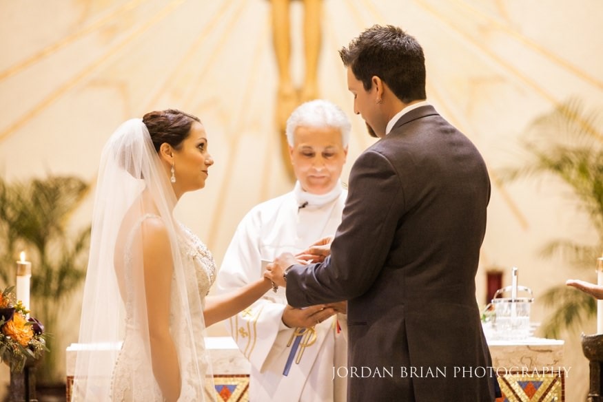 Ring exchange at St Raphael Catholic Church ceremony