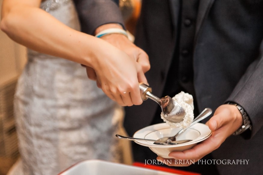 Bride and groom feeding ice cream Old Mill at Rose Valley