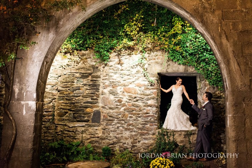 Bride and groom night portrait string lights Old Mill