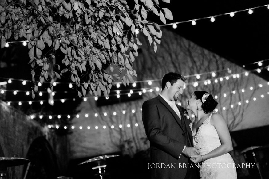 Bride and groom black and white night portrait Old Mill