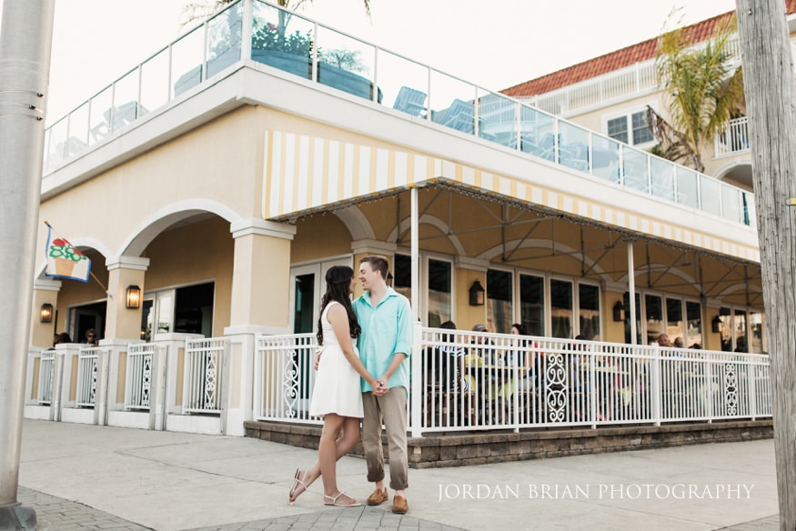 Couple in front of Flip Flopz bar in Wildwood engagement.