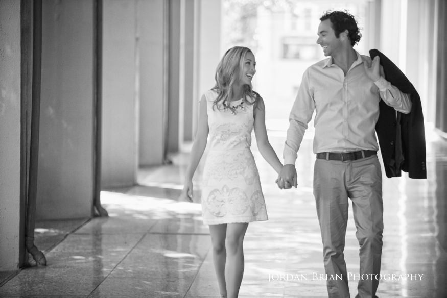 Rebecca and Nick portrait at Rittenhouse Square with Philly brownstones in the background