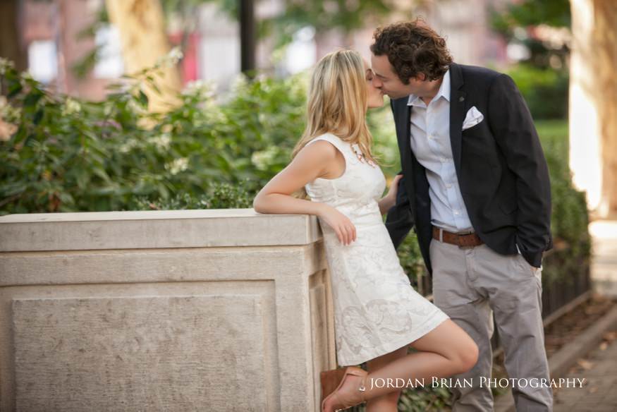 Rebecca and Nick candid laugh during their Rittenhouse Square engagement photographs