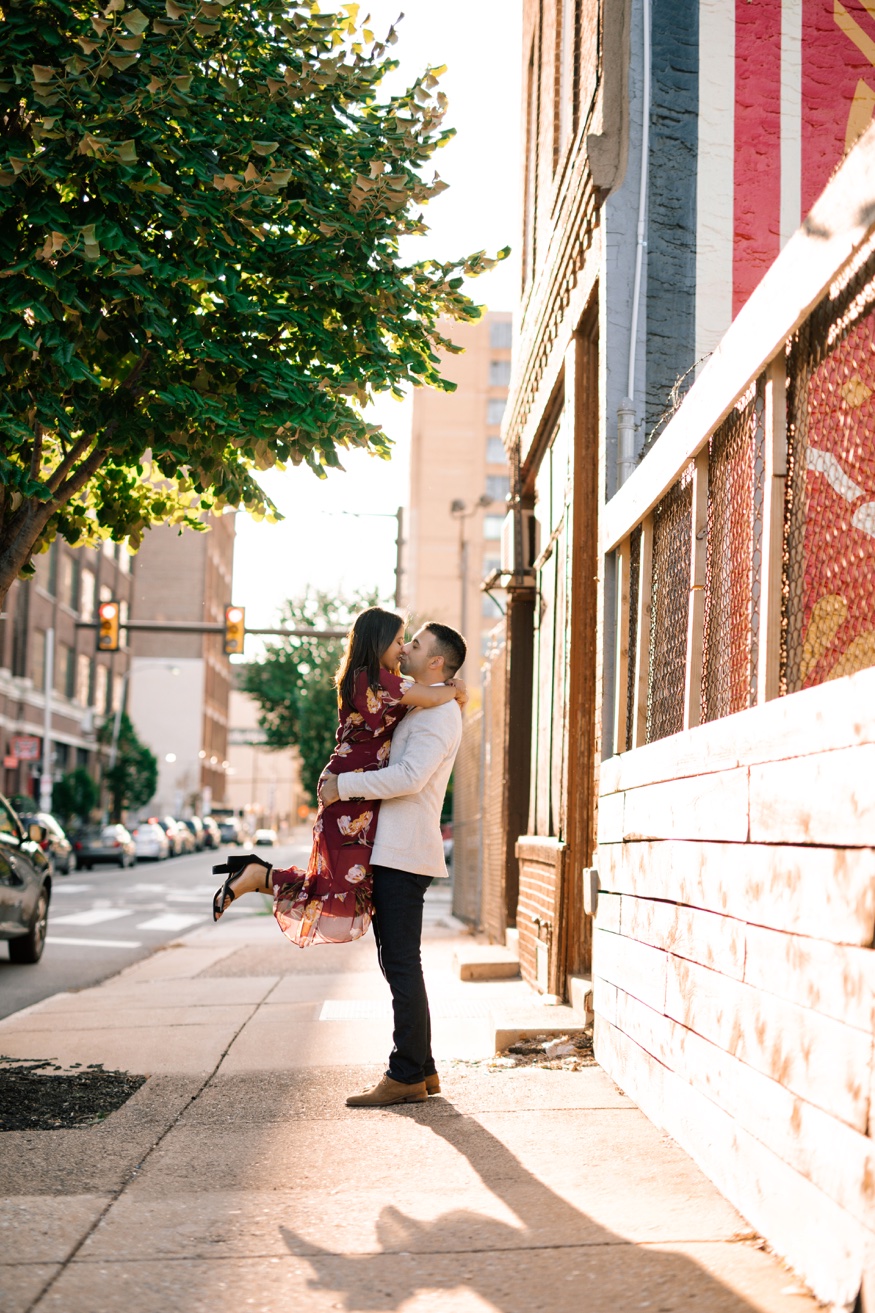 Vertical portrait of Eric and Roma on the steps at The Rail Park, Callowhill Street, Philadelphia.