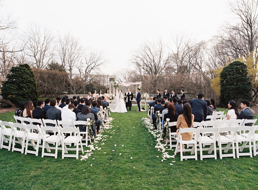 Outdoor wedding cermeony at Spring Brooklyn Botanic Garden wedding.