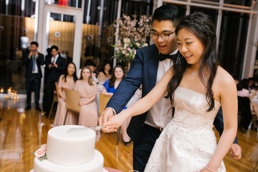Cake cutting at Brooklyn Botanic Garden wedding reception.