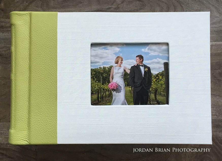 Custom green leather wedding album with white silk cover